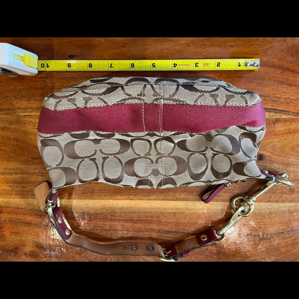 Coach mini bag. Brown, tan, and red. Great shape zipper closes and opens